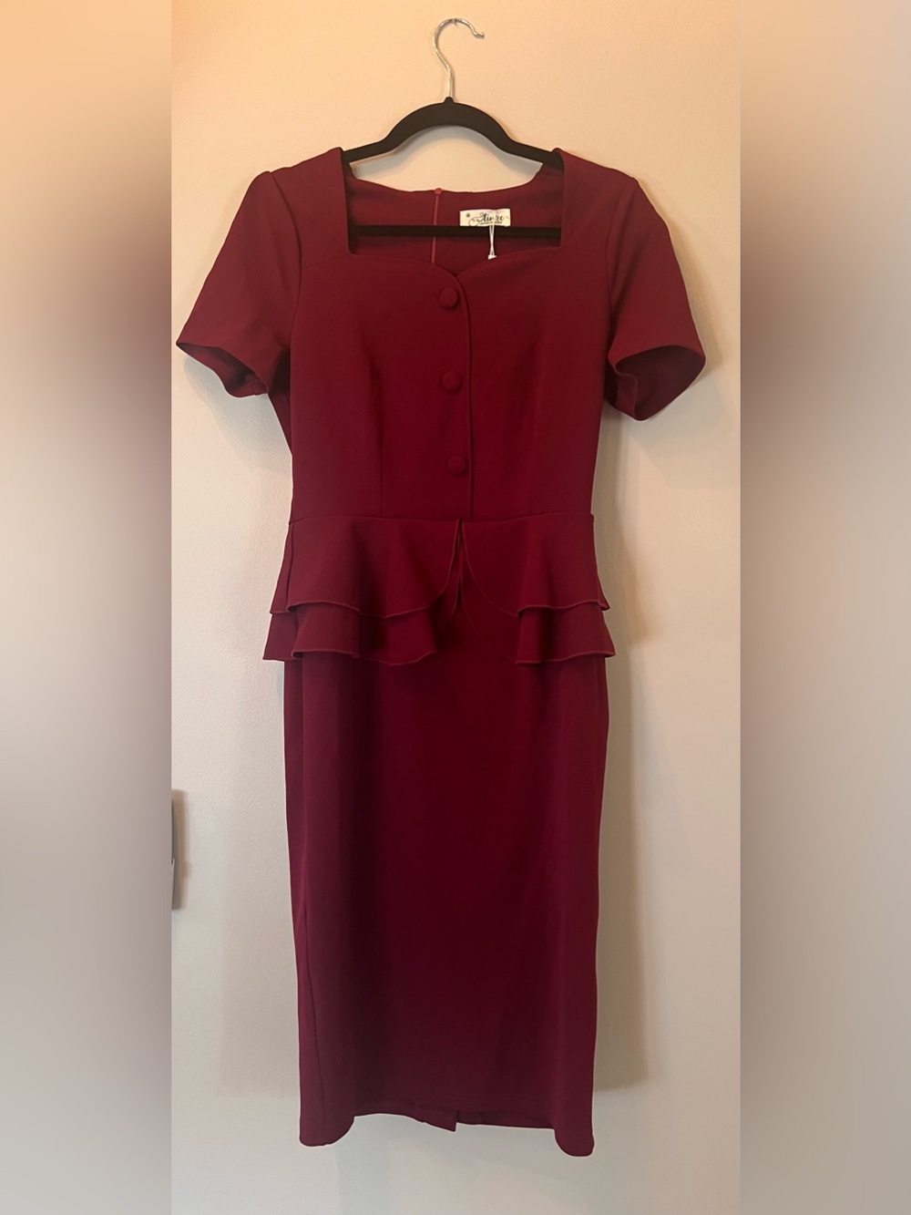 Red peplum midi 1950s style dress